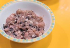 Fresh minced pork in bowl photo