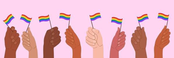 Vector illustration of hands holding flags with LGBT symbols.