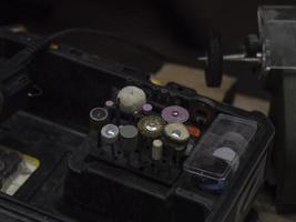 a set of nozzles for a drill in a special box. metal processing tool photo