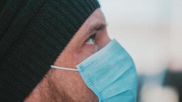 Close Up Portrait Of A Man In A Medical Mask photo