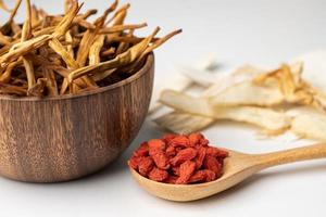 Chinese herb medicine with goji berries for good healthy. photo