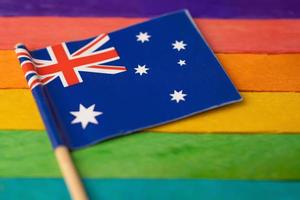 Australia flag on rainbow background symbol photo