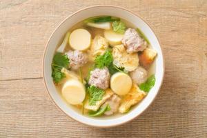 Fried egg soup or omelet soup with minced pork photo