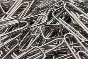 Close up paper clip on white background photo