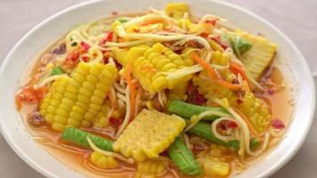 A Thai Spicy Papaya Salad with Corn video