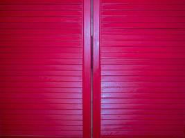 Closed pink venetian blinds in the kitchen in the restaurant photo