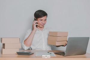 Man selling online at home small business ideas photo