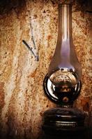 Abstract Vintage Oil Lamp on the Wall photo