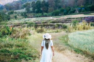 Woman in the hat happiness in the nature photo