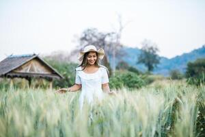 Woman in the hat happiness in the nature photo