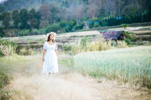 Woman in the hat happiness in the nature photo