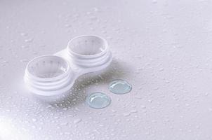 Contact lenses. Case close-up. Lenses lie oyadom. photo