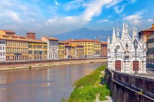 Pisa city downtown skyline cityscape in Italy photo