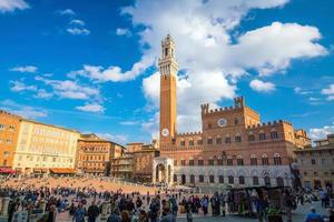 Crowd of people in Piazza del Campo square in Siena photo