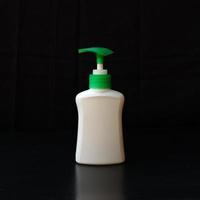 Hand sanitizer isolated on a black background photo