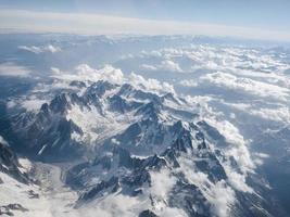 Aerial view of the Alps mountains photo