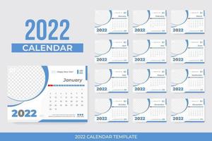 Blue desk calendar 2022 with frame vector