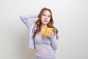 Portrait beautiful Asian woman holding coffee cup or mug on white background photo