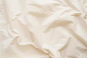 White fabric texture background, wavy fabric photo