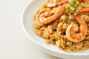 Garlic fried rice with shrimps or prawns photo