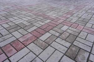 Pavement pattern made of paving stone tiles with textured surface