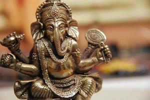 Close-up of figurine of god Ganesha