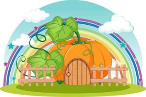 Pumpkin house with rainbow in the sky vector