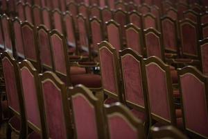 Empty chairs in the concert hall photo