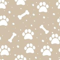 Seamless pattern with bones and paw prints of animals vector