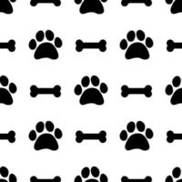 Seamless pattern with bones and paw prints of animals vector