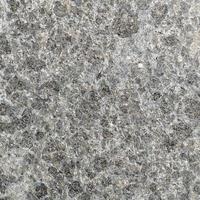 Dark gray granite stone texture. photo