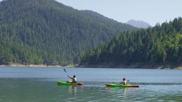 Couple kayaking in lake video