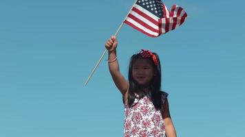 Girl waving American flag in slow motion, shot on Phantom Flex 4K video