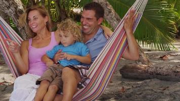 Family in hammock, Costa Rica. video