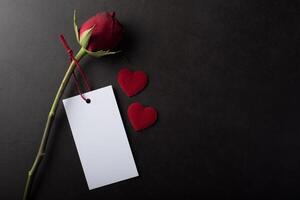 Red Rose with white card. photo