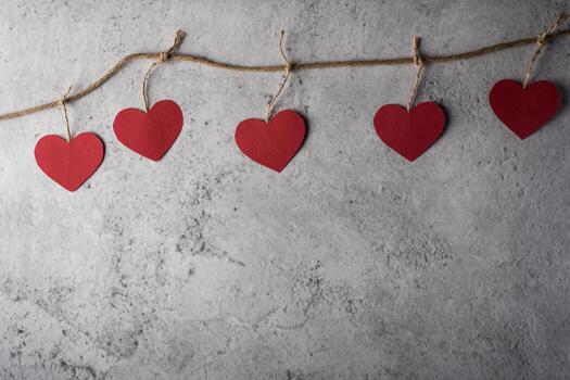 Top view Red heart on wall background. photo