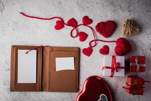 Top view Blank white card on wallet and heart gift. photo