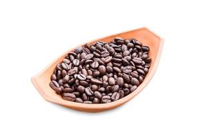 coffee beans in pottery bowl on white photo