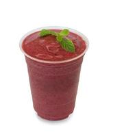 cold fresh berry smoothie in glass on white with clipping path photo