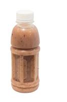 brown rice juice in plastic bottle on white with clipping path photo