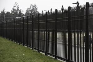 brown painted aluminum iron fence photo