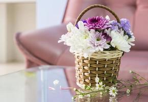 Chrysanthemum flower in the basket decorated living room photo