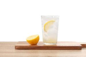 lemonade in glass on white background photo