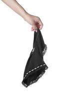 Women hand holding lingerie on white background photo