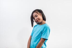 Portrait of Funny little girl acting in studio shot. photo