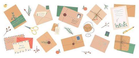 Conjunto de diferentes sobres navideños, sellos postales y postales. vector