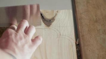 A Carpenter Cuts a Piece from A Pine Board video