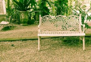 Old bench in park - vintage effect filter photo