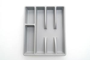 Kitchen box with cutlery for spoons, forks, knifes on white background photo