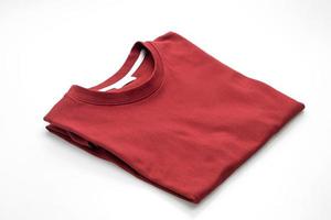 Folded t-shirt isolated on white background photo